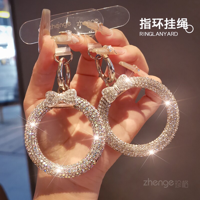 双域闪钻指环圈手机挂绳ins女蝴蝶结时尚小香风精致高端吊坠饰户外旅游行防丢套壳挂件钥匙扣拇指吊链子新品