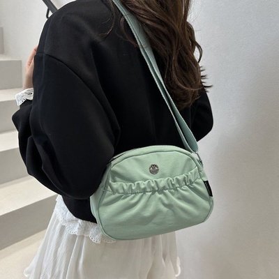 包包女斜挎小包包2025新款抽绳斜挎包百搭小巧尼龙布单肩手机包