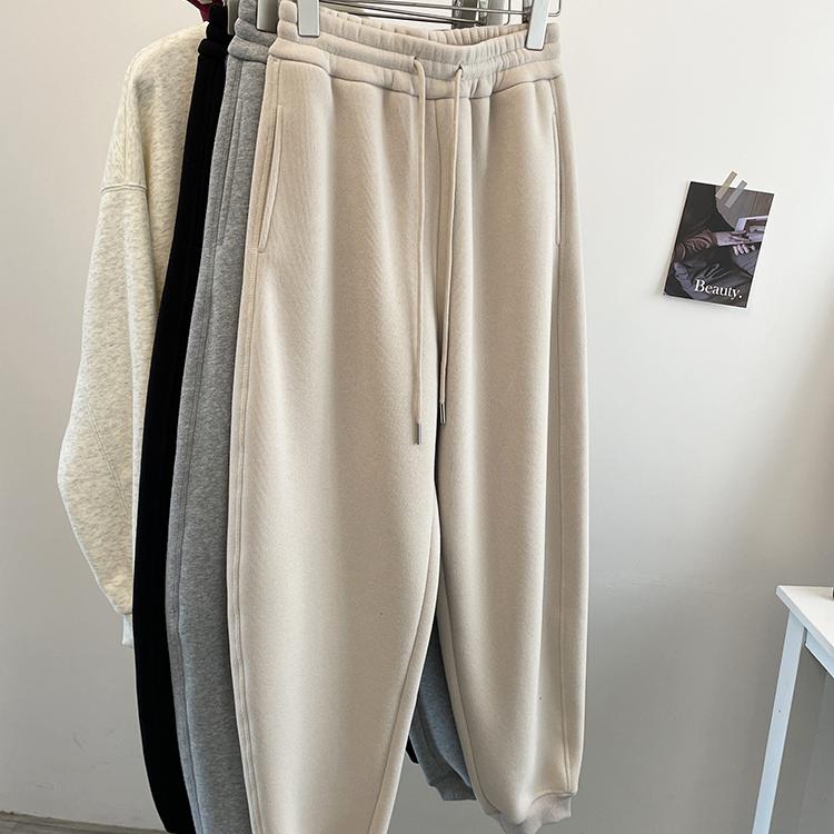 冬季超厚保暖束脚弯刀裤女卫裤