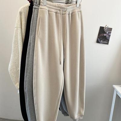 冬季超厚保暖束脚弯刀裤女卫裤