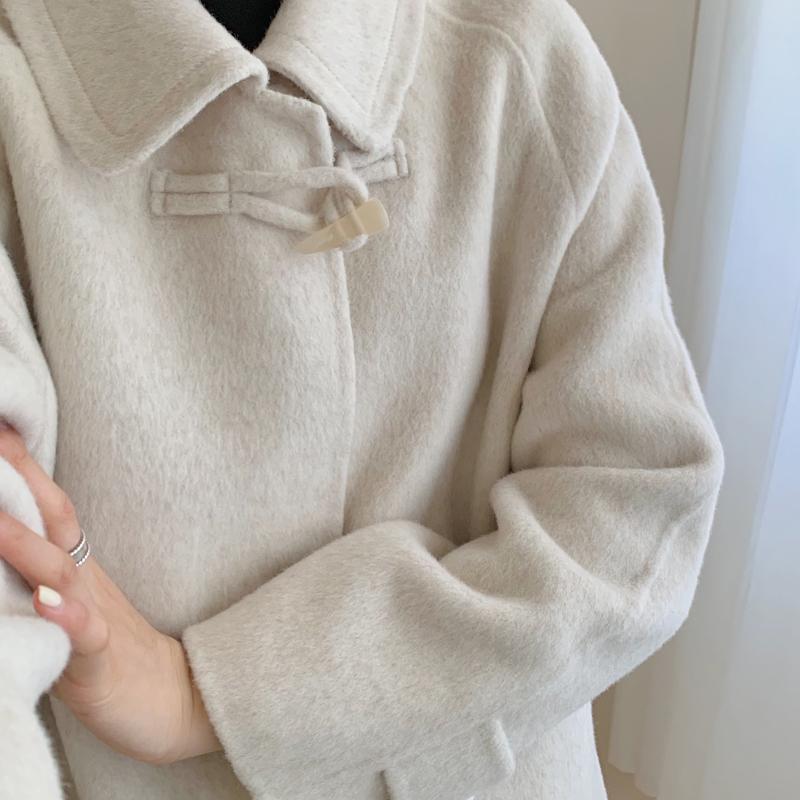 双面羊毛高级感大衣女2024秋冬翻领中长款韩版流行牛角扣毛呢外套