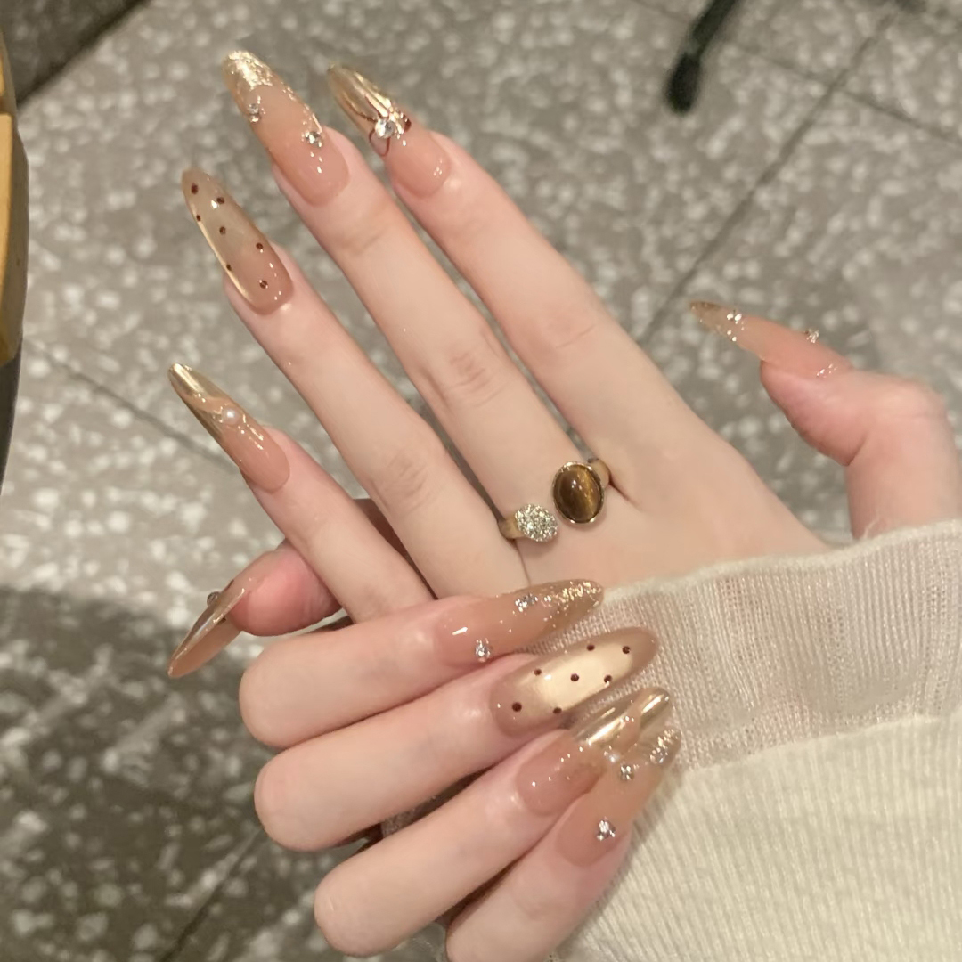 香槟金波点猫眼法式蝴蝶结穿戴甲