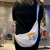 日系卡通面包小偷帆布刺绣包腋下包斜挎月牙包可爱饺子包便携腰包