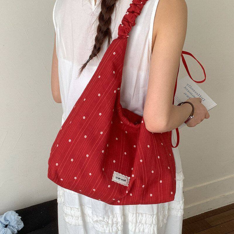 新款包包单肩包感松弛百搭休闲大容量斜挎包布包女士轻便2026通勤