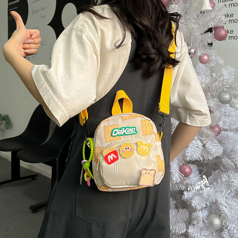 今年流行卡通儿童包女2025新款时尚可爱小孩帆布包休闲单肩斜挎包
