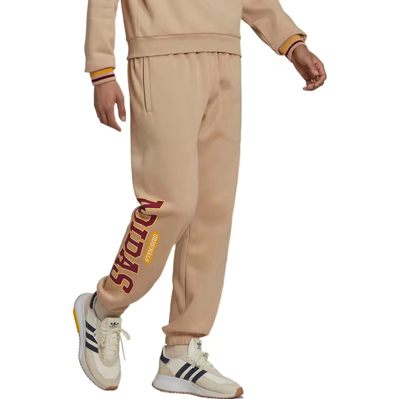 Adidas/阿迪达斯 三叶草 魔幻黄新款男子运动休闲束脚长裤 HY6044
