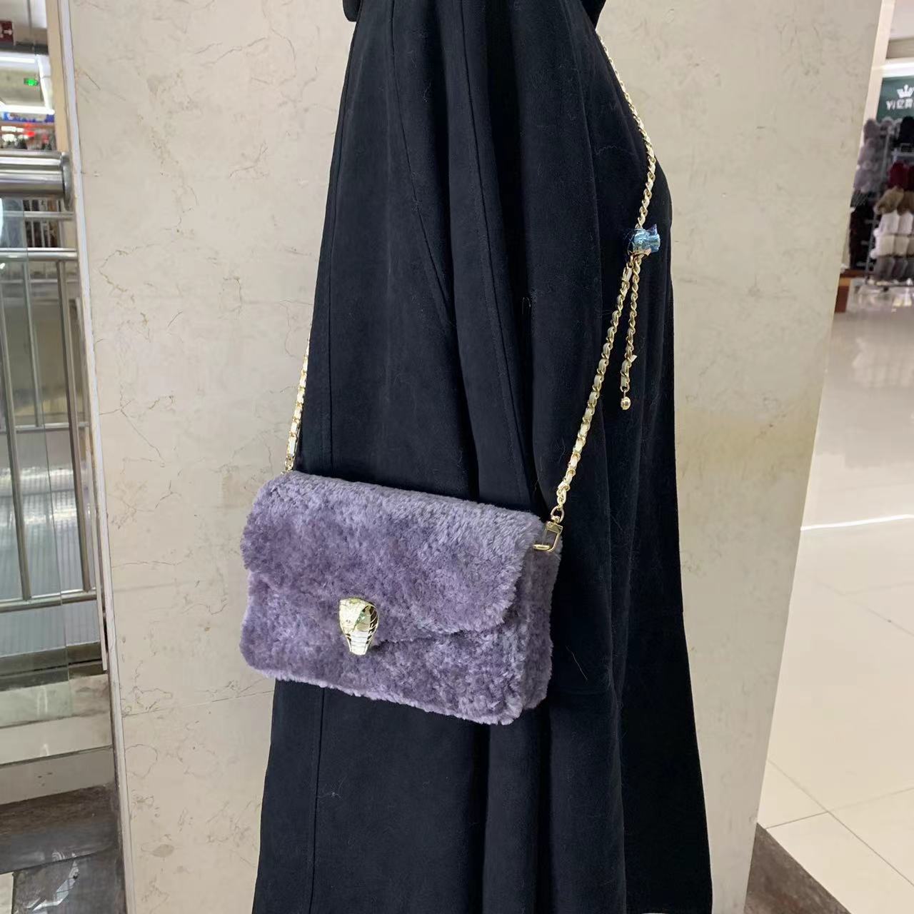 真皮真毛新款翻盖单肩斜挎包气质通勤复古休闲包包女新款四季通用