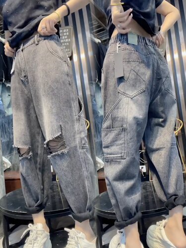 黑灰色宽松显瘦破洞哈伦牛仔裤