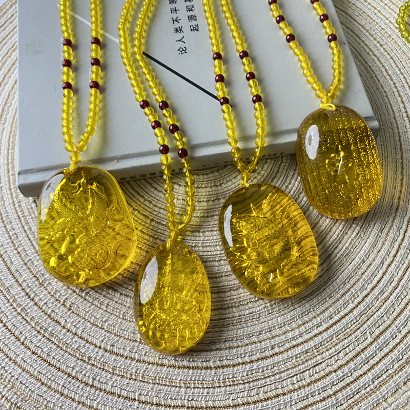 仿金琥珀蜜蜡内雕心经千手观音阴雕吊坠项链直播品货源水滴佛项链