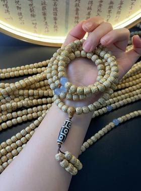 海南星月菩提黄金陈籽老料鸡油黄老型桶108颗九眼天珠吊坠佛珠项