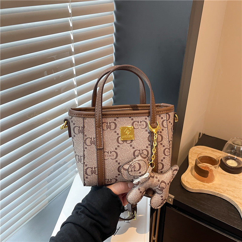 包包女2025新款复古印花水桶包韩版洋气手提包高级百搭单肩斜挎包,箱包皮具/热销女包/男包,水桶包,淘宝优惠券,粉丝福利购,淘宝优惠卷