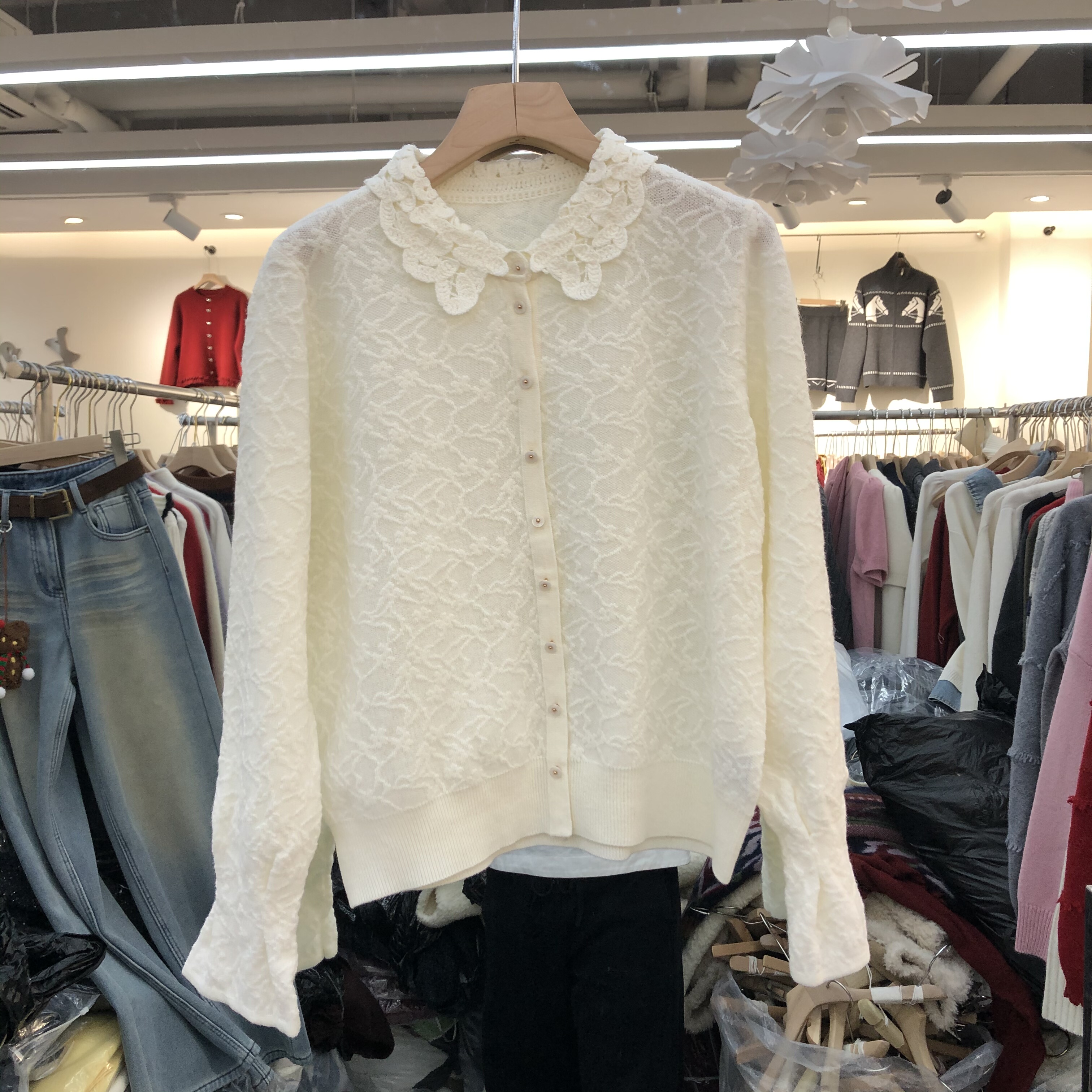 欧洲站2025冬季新款女士翻领提花微透细羊毛长袖开衫欧货时尚针织