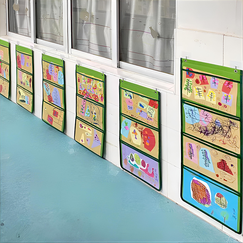 幼儿园作品展示挂袋美术绘画表征袋环创材料墙面布置装饰氛围改造图片