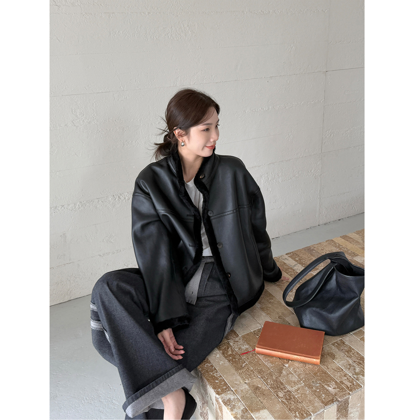 BTRS M丨黑色保暖美利努皮毛一体立领机车款双面穿羊毛皮草外套女