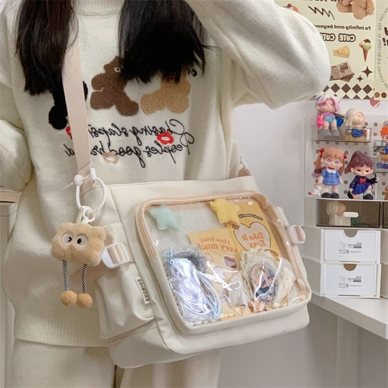 百搭学院风简约大容量上课装书邮差包女透明吧唧背斜挎娃包痛包