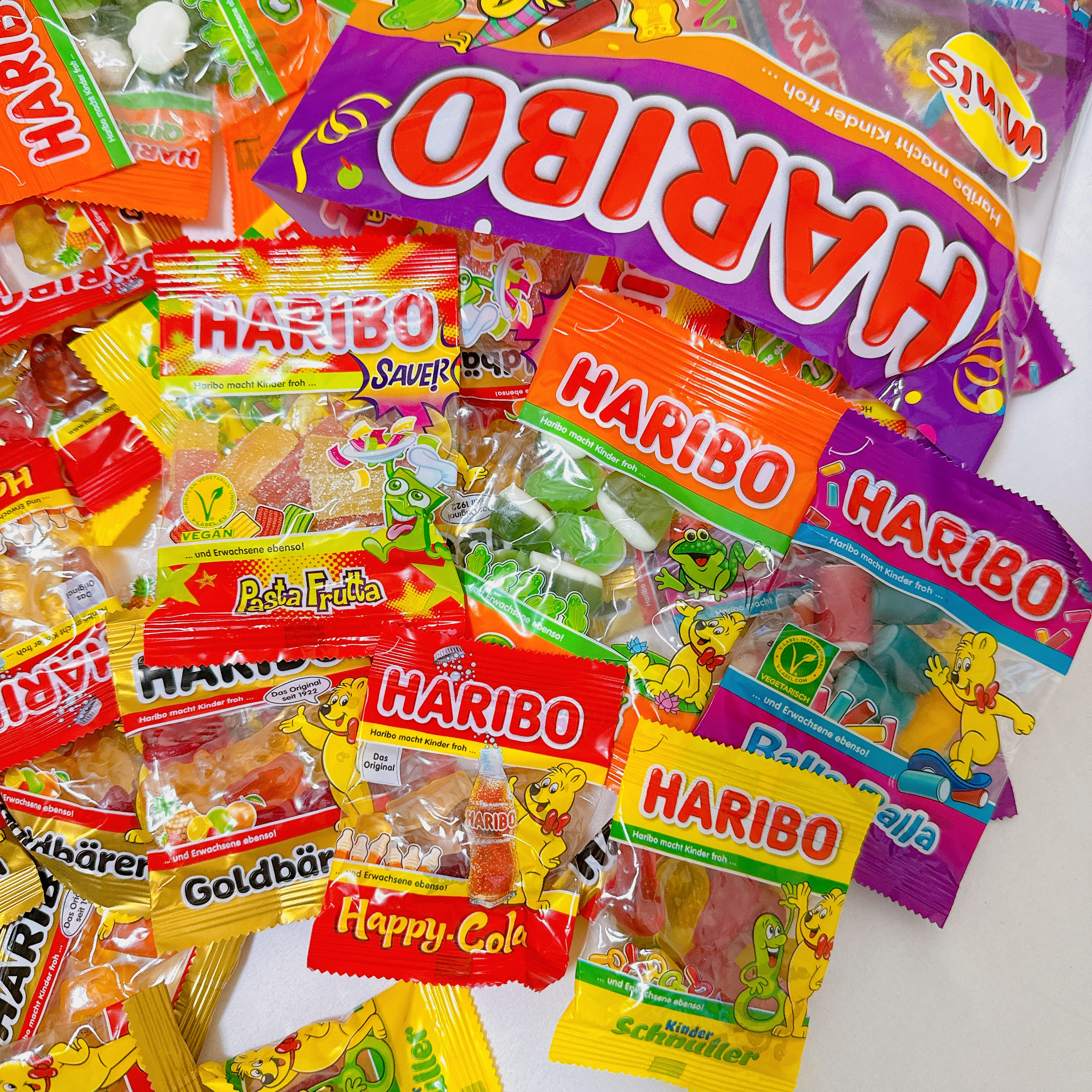 德国Haribo哈瑞宝果汁软糖混合金熊橡皮糖酸砂糖彩虹像素薯条可乐