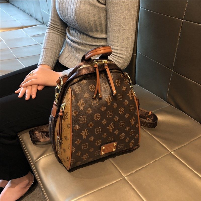 香港品牌双肩包女士2025新款大容量真皮多功能旅行包背包书包高级