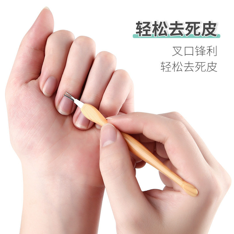 각질 제거 및 매니큐어 손톱 제거 및 큐티클 관리 각질 제거를 위해 손가락을 집에 두십시오. 각질 삽 손톱 및 매니큐어 도구