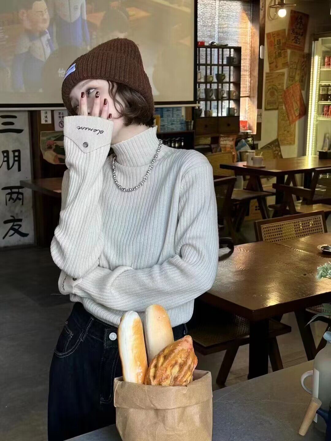 欧货2024冬季新款时尚卷边袖扣全羊毛毛衣女韩系半高领坑条打底衫