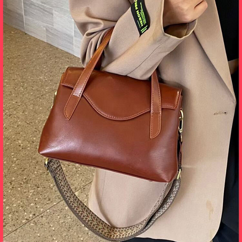 纯牛皮大容量双层斜跨手提包女百搭2025新款真皮简约单肩休闲女包