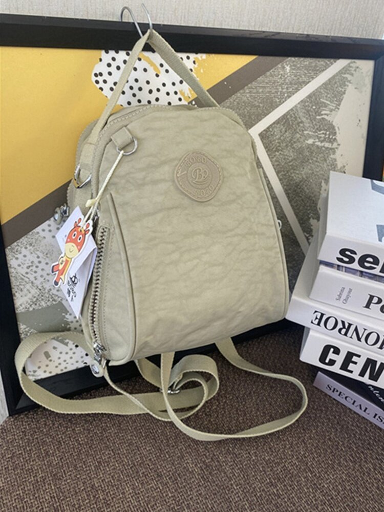 2026新款女士迷你双肩包斜挎包防水牛津布出行背背包轻便纯色高级