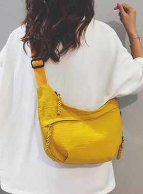 简约时尚帆布包女2025新款上班通勤饺子包休闲百搭运动旅游斜挎包