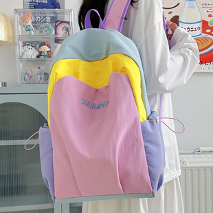 2025新款初高中大学生书包女大容量百搭抽绳轻便旅行双肩包撞色包