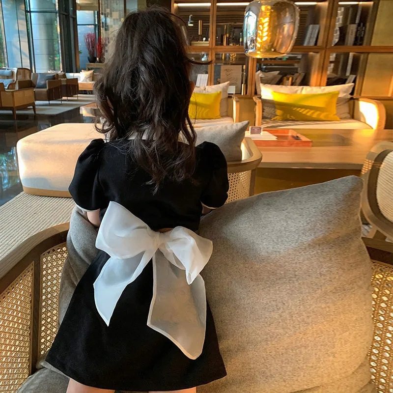 2025女童后背蝴蝶结镂空po连衣裙