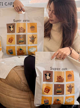 挖孔可爱方糖卡通手提袋大容量礼品袋塑料袋包装袋防水服装童装袋