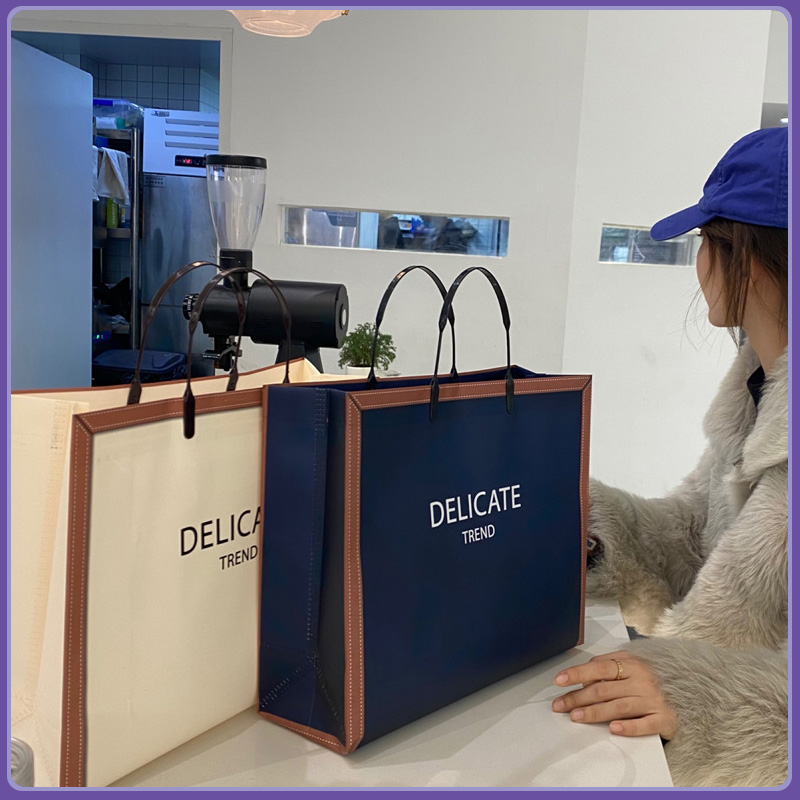 复合塑料DELICATE手提免税店袋高档时尚服装店袋子礼品包装袋防水