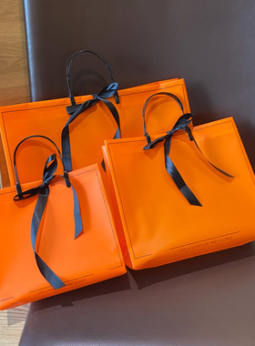 ins橙色服装店手提袋加厚复合袋防水礼品袋塑料袋免税袋手拎袋