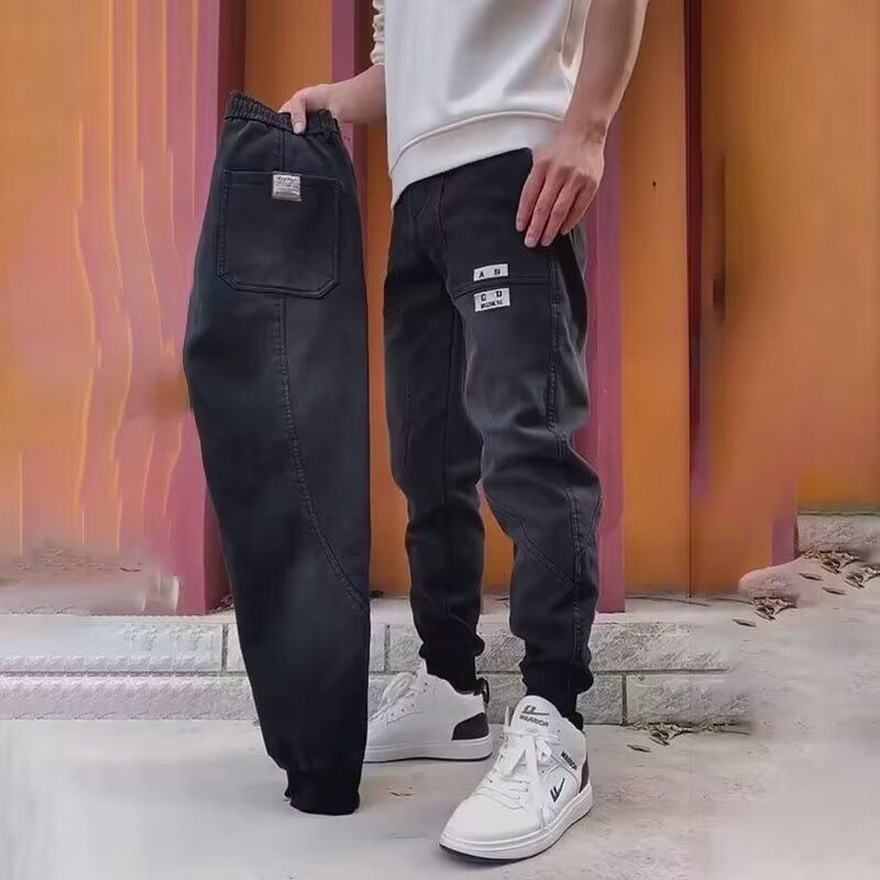 秋季裤子男士黑灰色牛仔裤弹力束脚哈伦裤刺绣拼接修身小脚休闲裤