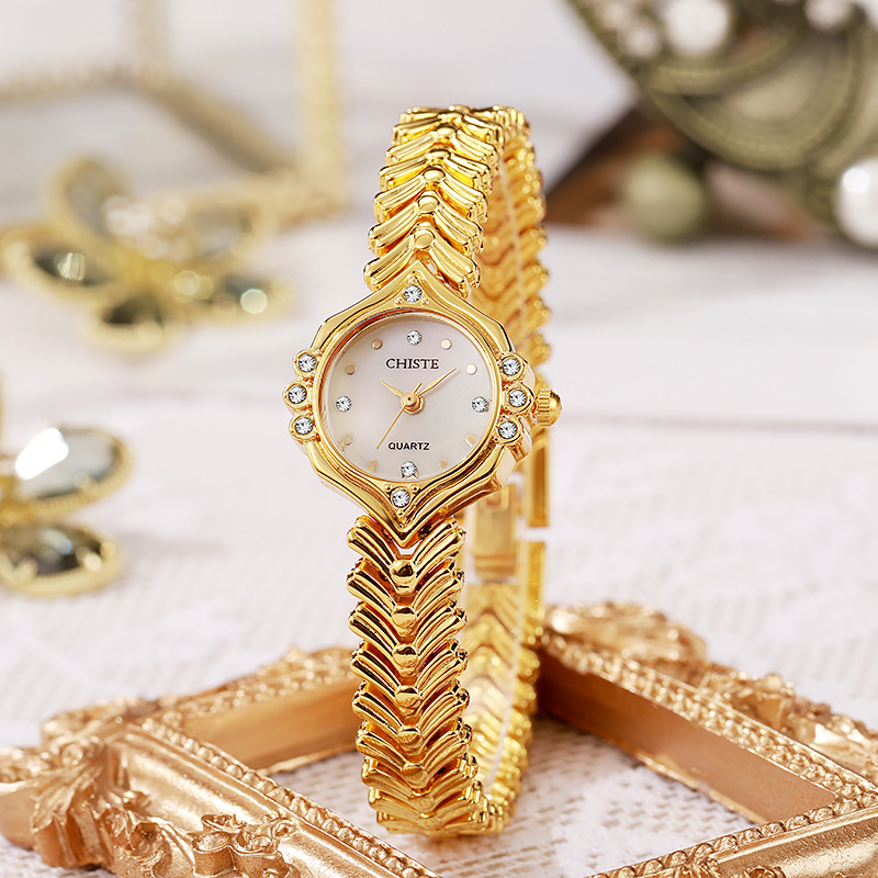 女款时尚女表贝母鱼尾造型手链表