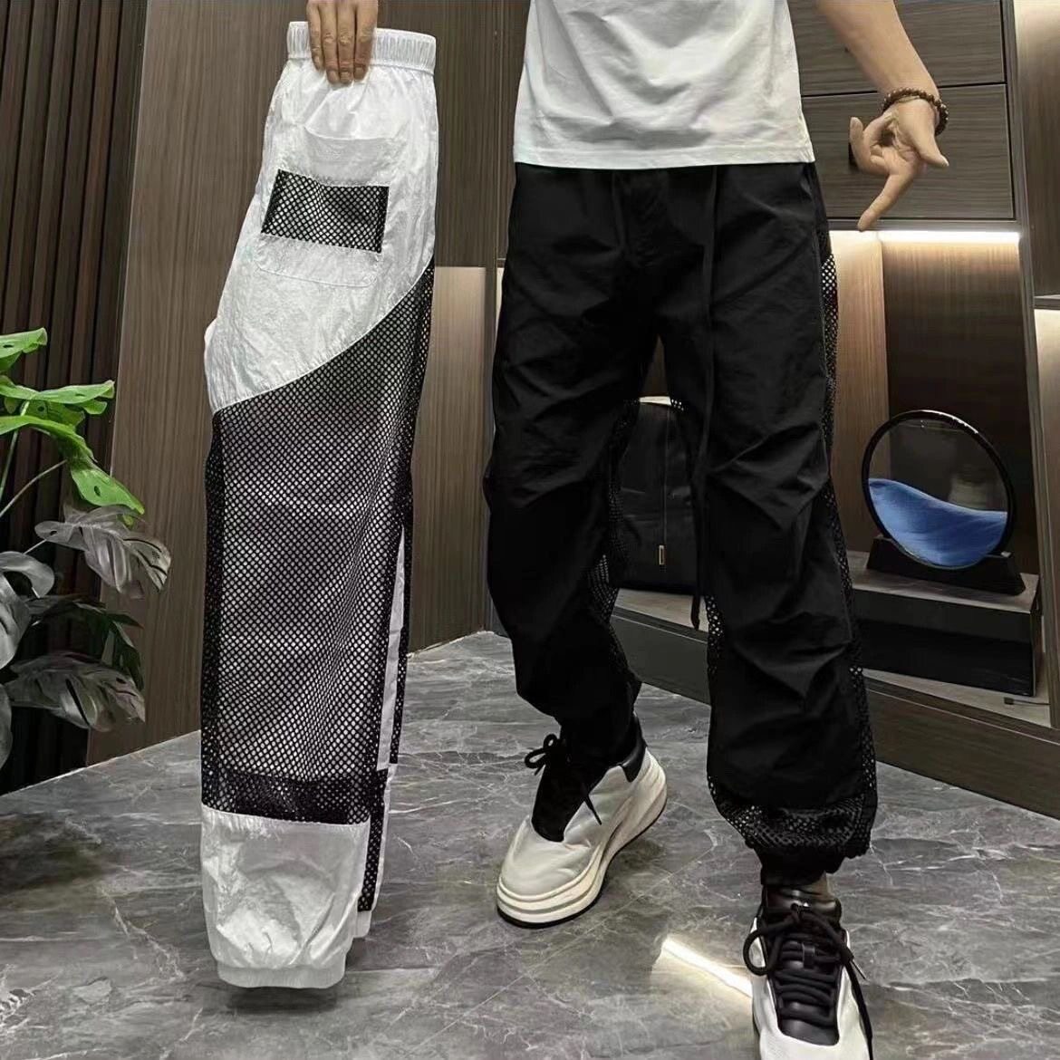 2026夏季个性网眼拼接休闲长裤男士百搭运动透气束脚宽松哈伦裤子