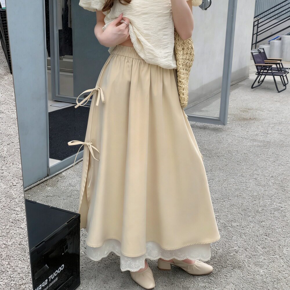 杏色蕾丝边半身裙女春2026春夏新款蝴蝶结高腰显瘦a字裙中长裙子