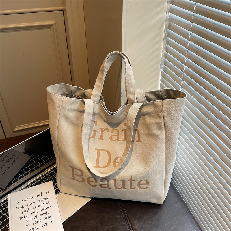 韩版字母印花帆布包女大容量手提妈咪托特包休闲简约通勤单肩包