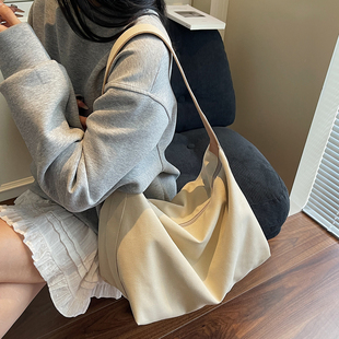 时尚慵懒风饺子包2025新款大容量厚实帆布斜挎包女单肩百搭托特包