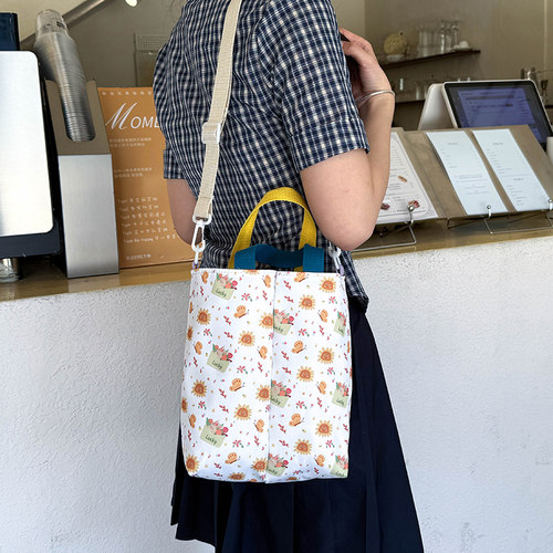 日韩印花帆布水桶包2026新款