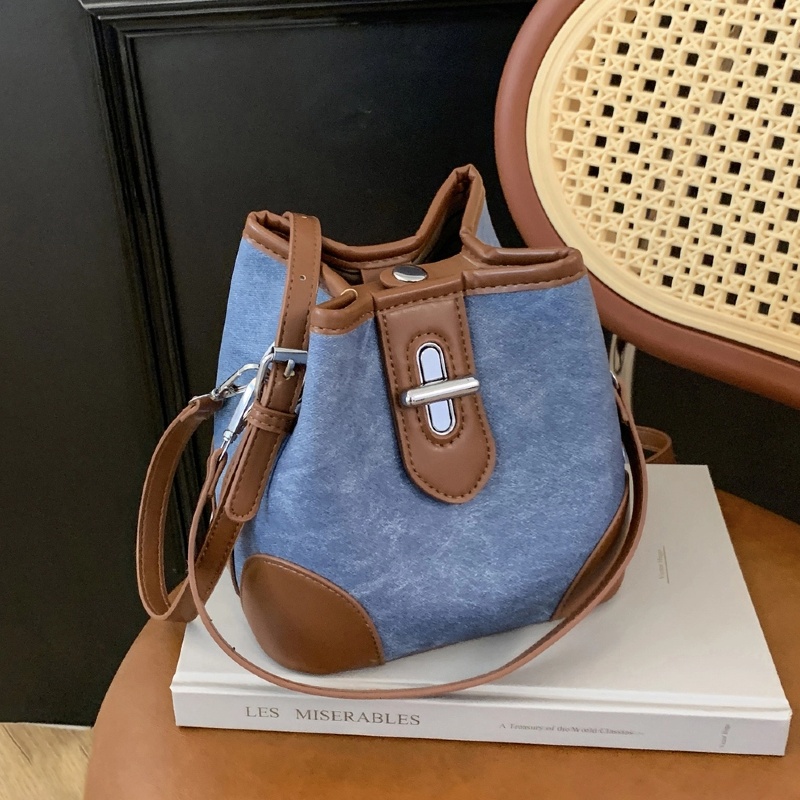 包包女式2025新款水桶包胶囊高级感小众上班手拎手提单肩斜挎包潮