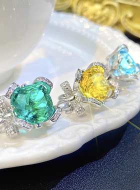 高端网红直播托帕蓝戒指祖母绿大钻紫水晶彩宝蝴蝶结满钻开口戒指