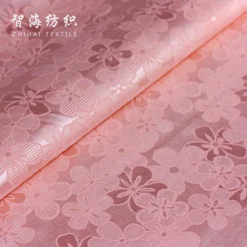 中式国风粉红色暗花纹缎面料布料