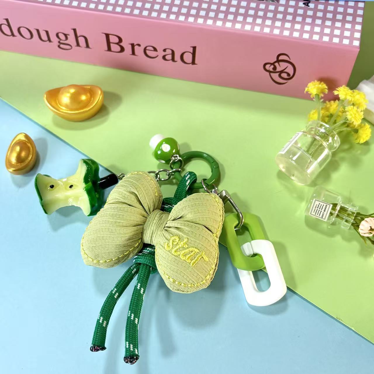 新款可爱糖果色花朵蝴蝶结圣诞仿真立体苹果核手机链包包挂饰挂件