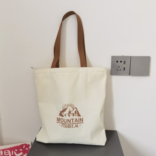 慵懒风文艺帆布包女带拉链上班通勤简约时尚单肩包学生外出手提袋