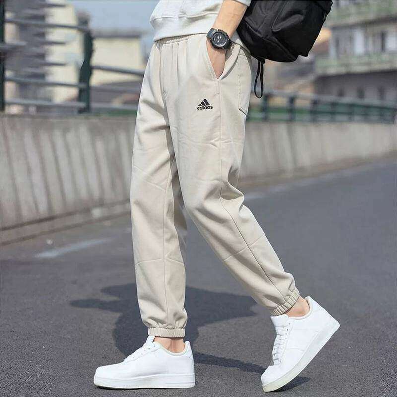 Adidas阿迪达斯长裤男士新款宽松束脚卫裤针织亲肤休闲收口运动裤
