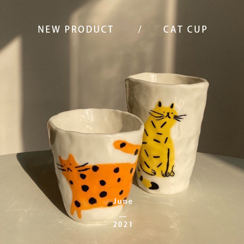 旷野呼告| 原创手捏不规则手握杯橘猫黄猫设计手作小众咖啡杯 - 封面