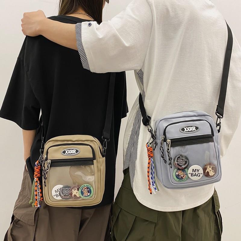 痛包斜挎包男孩男童男青少年初中生小挎包男生包包小学生帅气背包