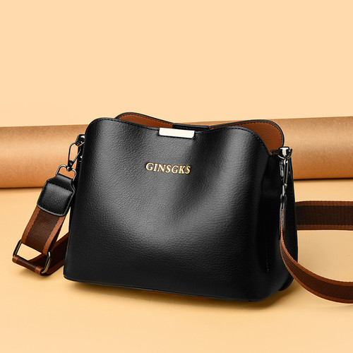 女包软皮2025秋冬新款水桶包百搭简约多隔袋妈妈宽肩带单肩斜挎包