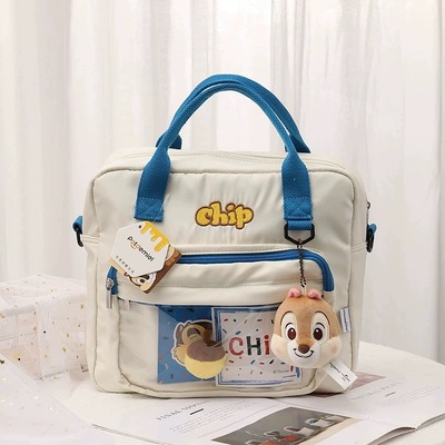 正版迪士尼斜挎包女草莓熊包单肩包背包电脑包可爱卡通学生双肩包