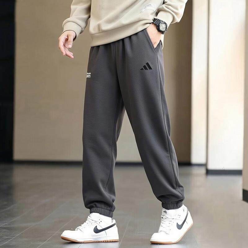 阿迪达斯裤子男秋季新款宽松篮球收脚卫裤灰色防风复古针织运动裤