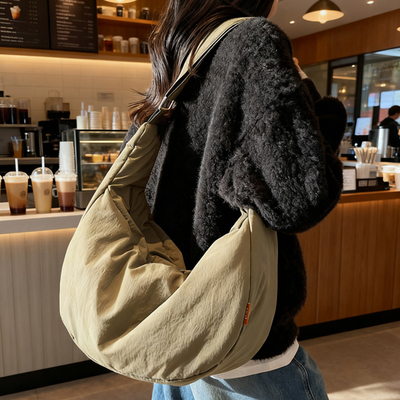 布袋包女大容量2025新款秋冬百搭休闲单肩斜挎包高级感通勤饺子包